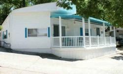 This is a doll house! Immaculately cared for with a new roof in summer of 2011. It sits right in the middle of Osage Beach shopping and restaurants by boat or vehicle! You cannot find a better location. It is a quiet cove with a main channel view. The 44'