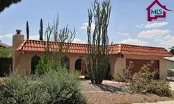 Within this well-kept 1536SF home are 3BR and 2BA. The curb appeal here is quite apparent from its red-tiled roof down to its beautiful mature desert plants. To enter the house, you must pass through an enclosed saltillo-tiled courtyard. Once inside, you