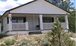 Great location next to Colorado Mountain College. Fantastic views of the 14000' mountain peaks and overlooking Leadville. Enjoy these views while relaxing on your huge front porch. Great open floor plan. Washer and dryer hookups.Listing originally posted
