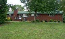 NICE BRICK RANCHER WITH LARGE YARD, HUGE GARAGE WITH PLENTY OF PARKING.Listing originally posted at http