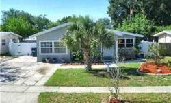South Tampa Spacious 4br+Office/2ba 1668SF 'Turn-key' Home that the owners have lovingly maintained and upgraded and its NOT a short sale! The value begins with GORGEOUS & GLEAMING hard wood and laminate floors throughout living areas/beds/kitchen,