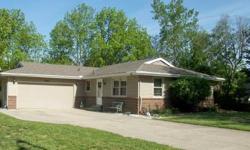 Enjoy this brick and vinyl sided home with nothing left to do but move in! It is more spacious than it appears with both a formal living room (now being used as a diningroom your choice!).Since 2005, the many updates include