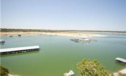 A TRUE Lake Travis waterfront. Located on the main Colorado Rive channel, this home is NEVER without water, even during the most extream drought. Sitting on .91 acres, this property includes 112' of deep water frontage, but is not located in the