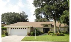 Beautiful home in one of Pinellas County's nicest neighborhoods! Home features a new roof installed in 2010, new insulated garage door and new exterior paint in 2010 and remodeled master bath in 2011. Three way split and open floor plan with large