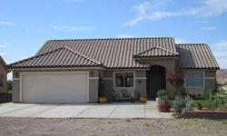 Come by to see this well kept ENERGY STAR home! Enjoy majestic views of the Flat Top Mesa from your covered patio while watching your mini orchard blossom. On site RV parking. Beat the heat with UNLIMITED exterior water for only $15.50/month!
Listing