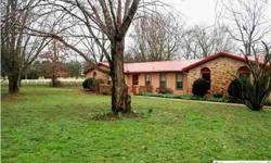 Spanish Style Rancher on .75 Acres+/_ Next Door To Colonial Golf Course, features great room with wood burning fireplace, formal dining room, kitchen with breakfast area, 2 large guest bedrooms,full bath and Master bedroom with 3/4 bath.Large corner