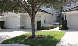 Gated ONE LEVEL condo in PRIVATE GOLF & COUNTRY CLUB.Volumne ceiling in Master bedroom. Oversized garage for car & golf cart. Close to medical, shopping, downtown and Pkwy to Tampa & Orlando. Monthly fee includes the following. All exterior maintenanceon