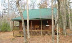 PRICED TO SELL! Well maintained cabin offers 2 bedrooms, 2 bathrooms and a loft on almost 1 acre, and less than 5 miles from 515. Downstairs bath has a Jacuzzi tub and a shower. A spacious upstairs bedroom has a full bath plus and open LOFT/office area.