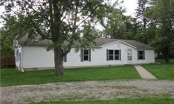 Very nice manufactured home on foundation. This spacious home features, fireplace in the family room, walk-in closets, spacious master bedroom and bath, kitchen with wood cabinetry and island, and shed with heater. Fenced in backyard for privacy. Sewer
