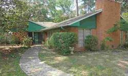 Well maintained three bedroom, two bath home on large corner lot. Only two owners in this lovely home located in the heart of Conroe. Close to shopping, medical facilities, and I-45. This home offers an increibly large family room with high ceilings, a