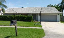 GREAT PRICE FOR THIS 4 BEDROOM HOME ON A LARGE CORNER LOT. HAS A FENCED BACKYARD WITH PLENTY OF ROOM FOR A POOL AND LOCATED IN SUBURBAN BOYNTON BEACH. SPLIT BEDROOM PLAN WITH HIGH CEILINGS AND OPEN LAYOUT. MASTER BEDROOM HAS SLIDING GLASS DOORS TO THE