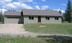 Brand New home as of October 2011. Beautiful top quality Hickory wood floors, granite counter tops, hickory wood cabinets and main floor utilities. Enjoy your own little farm land on 5 level acres. A fenced in garden has already been planted. Only 10