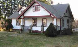 American Craftsman style home built in 1930.Field stone fireplaced LR w/french drs to 4 season sunrm.All trim is oak but some painted. Nice older home features,"Good bones" but does need updating.Over 1 acre-Contingent on seller finding home of choice.