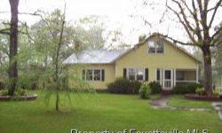 -Live in the country on over 2 acres in this cozy ranch with 3 BR,2 BA, formal DR,and 3 fireplaces. Excellent 2 stall barn with tack rooms, power and water and private paddock will keep your horse comfortable. North of Fay. HWY 13. Call Mike (910)