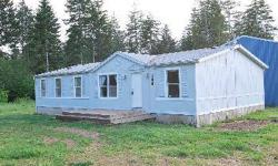 2 bedroom + den, 2 bath manufactured home on 1.7 level acres. Giant dream 3300 SF shop for hobbyist, mechanics or collectors. Home features a large kitchen w/ breakfast room. Big master with soaking tub and shower. Vaulted ceilings, and large bedrooms.