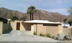 Double lot opportunity in the La Quinta Cove. Two units and pool located on one lot. Front unit has living room, dining room, kitchen and 3/4 bath. Back unit have three bedrooms or two bedrooms plus den and a full bath. Block walls with sliding gate for