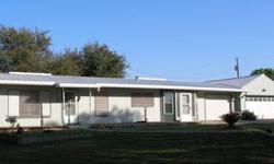 This 3 Bedroom 3 Bath home sits on 7.56 acres. with approx. 400' of Nueces River frontage (that's right, where the white bass run.) Property is cross fenced, as well as chain link fencing for the front and back yards. Covered brick patio in the back.