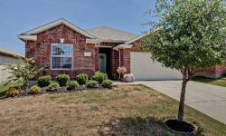 Adorable home in popular Frisco Ranch offers spacious open floor plan! This eye appealing home features a huge living area with a wood burning fireplace, an enormous kitchen with stainless steel appliances, and attractive arches and art niches that really
