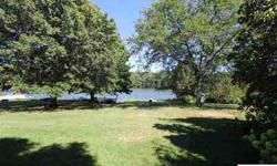 Bring your fishing rod and boat! Come enjoy this charming 3 bedroom, 2 bath home with walkout to the lake. This home features a large lower level family room which is accented with stone and lovely views of the lake. Enjoy the fireplace, an appliance