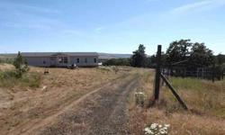 A little elbow grease could make this batchelor pad shine! Incredible value for 20 acres, 2007 Fleetwood MH, 1909 sq ft, open floor plan w/ warm colors, 3bd/2ba, heat pump with A/C. Huge master bdrm w/ built in desk. Full Mt Hood view & cap of Mt Adams.
