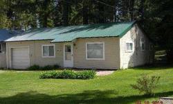 This cute cottage has everything you need. Park your boat for the summer at your own boat slip and enjoy the nicest beach on Diamond Lake. Recent updates to the home include a new metal roof, vinyl windows, plumbing, heating, paint & insulation. Brand new