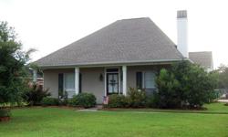 This home is in a great subdivision, Acadiana Place, on Highway 16. The home is newly painted, and has new hardware on all cabinetry. The dining room has a vaulted ceiling and a bay window. The living room has wooden bookcases on both sides of the