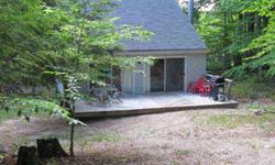 Salbox on double lot, private setting,a walking trail short distance from beach on the west shore. Maine floor master. Large loft.New windows & roof.Deck. Shed for storage& which includes golfcart. Maintenance free.Woodstove. Sold furnished.Listing