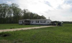 Peaceful country living in the swartz area. This 2,400 (2009 model) heated square foot 4 beds, 2 extremely large full size bathrooms,, manufactured home located on five acres comes with all the extras. Travis Brady Howard is showing this 4 bedrooms / 2