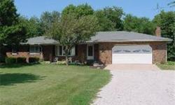 This beautiful brick ranch home on 14 acre estate with 7 wooded acres has 3 BRs & 2 BA's, a lovely large living room and a cozy family room with a fireplace off the kitchen. Sliding glass doors open to a concrete patio. This home has a full basement with