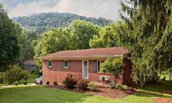 -Happiness is a tree-lined street with children playing, neighbors who greet each other by name and a 3 BR timeless ranch with fully fenced backyard and glassed in sunroom. Updated HVAC, appliances and windows. For additional living space expand into the