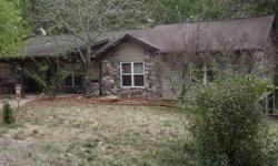This 3/4 bedroom 2 bath home offers plenty of living space plus the seclusion that so many of us desire!! Three wooded acres are the setting for this updated home that boasts 2 living rooms (1 on the main level and one in the full, finished basement), a