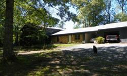 3,100 sq. foot with 3+ bedrooms and 3 baths. 3 car garage with doors. 24 ft. above ground pool with a salt system. Original house built in 1973 but has been remodeled and additions completed in 1993. Large shop in back. 5+ acres that is mostly fenced with