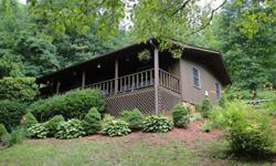 Not very often do I come across a home that just flat out STUNS me.. This is ONE of those! Located in the majestic Smokey Mountains of Franklin NC, this two bedroom, 2 bath home will stun you too. This Franklin NC home is nestled in a story book cove like