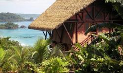 Beautiful rainforest and Caribbean Ocean views from a stunning Jungle Lodge in Panama!! Known as one of Panama?s most beautiful beaches, Red Frog Beach & Rainforest Resort is located on Isla Bastimentos, a short boat ride from Bocas town. Set into the