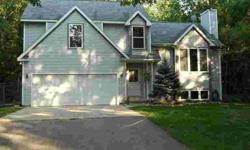 Lovely secluded wooded country setting that backs up to state land. Great room with cathedral ceilings and fireplace. Updated decor and landscaping, walk-out finished basement with family room. Move-in condition!Listing originally posted at http