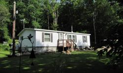 This is the perfect home for those looking to downsize or for a first time home buyer. With a generator hook up you are always covered. Use the woodstove to save on your heating bills! Includes a 1 acre lot directly to the right of the property. (245 ft