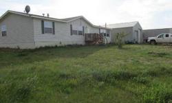One owner's pride shows in the condition of this property! Home has an open floor plan with new laminate flooring on 2.5 acres. 32x40 insulated show with concrete floor.
Listing originally posted at http