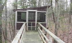 Spacious yet cozy contemporary home features open floor plan. Partially finished walk-out basement is an ideal home office/studio/workshop with plenty of built-in storage. 2 full baths include Jacuzzi soaking tub. Commune with nature on large deck set