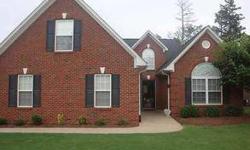 Immaculate maintenance free all BRICK Home in District 5. 3BR plus bonus room. Open floor plan with gas log fireplace and wood floors. Eat in Kitchen with ceramic tile floors and stainless steel appliances. Trey ceiling in Master Bedroom with double