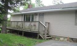 SHORT SALE--Great Home In Upper Greenwood Lake! Spacious Living Room with Vaulted Ceiling and Stone FIreplace, Two Good Size Bedrooms, Large Deck Overlooking Back Yard. Find homes on the GSMLS, click on to website