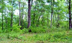 Circle drive already in. 1.23 acres wooded w/potential view w/clearing. 2BR septic permit already on file. Perfect for a mtn cabin or to set up your RV! $15,000Listing originally posted at http