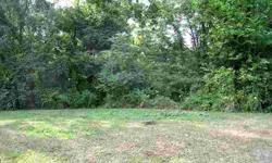 Rolling Building lot in Poplar Ridge subdivision. Great lot for walkout home. Wooded lot slopes to rear where creek runs through.Listing originally posted at http