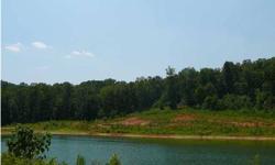 Scenic view overlooking Fishing Lake. Property Sold as-is. Seller and agent make no guarantees on equipment, systems, or other property improvements. Buyer is reponsible for confirming lot location, Community restrictions, utilities, and any other due