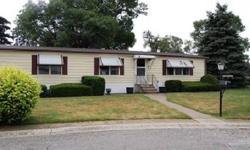 Double wide mobile home with over 1700 square feet! Huge sunny living room with ceramic foyer. Large "U" shaped kitchen with cook top, built in oven and breakfast bar. Formal dining room with built in cabinets. Great laundry room with storage cabinets and