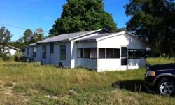 This property is primarily being marketed for the lot BUTthe home on the lot is incuded in the price. Home is in major disrepair. Home would not qualify for a bank loan and must be a cash sale. Seller warrants nothing about the condition on the home and