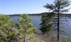 Gated community on Lake Htcher, close to National Forest. Underground utilities, central water and sewer. Community park with private boat dock, covenants and restrictions.
Listing originally posted at http