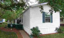 A very nice above average 16x72 Holly Park mobile home. This 2 bedroom, 2 bath home has vinyl siding and a shingled roof. There are gutter guards on the gutters and shutters. A very nice home here.Listing originally posted at http