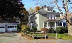 Charming New Englander near Bates College offers lots of room, charm & character with gleaming wood floors, beautiful woodwork, fireplace, built-ins, formal living & dining, sunroom, 5 bedrooms, fenced yard, lovely covered front porch and 2-car