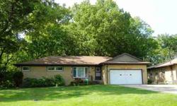 This solid brick ranch is situated on a gorgeous wooded lot and features a wonderful finished walkout basement. The 1st floor features an L-shaped living and dining room w/cove ceilings. To the left are the 3 bedrooms and the main, updated bathceiling