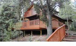 CREAM PUFF CABIN IN PLACER! Well maintained cute as can be cabin on a remote lot across from the pond and river. Perfect for the weekend warrior who wants something in the lower price range without the cabiny feel. Light and bright. New appliances and new